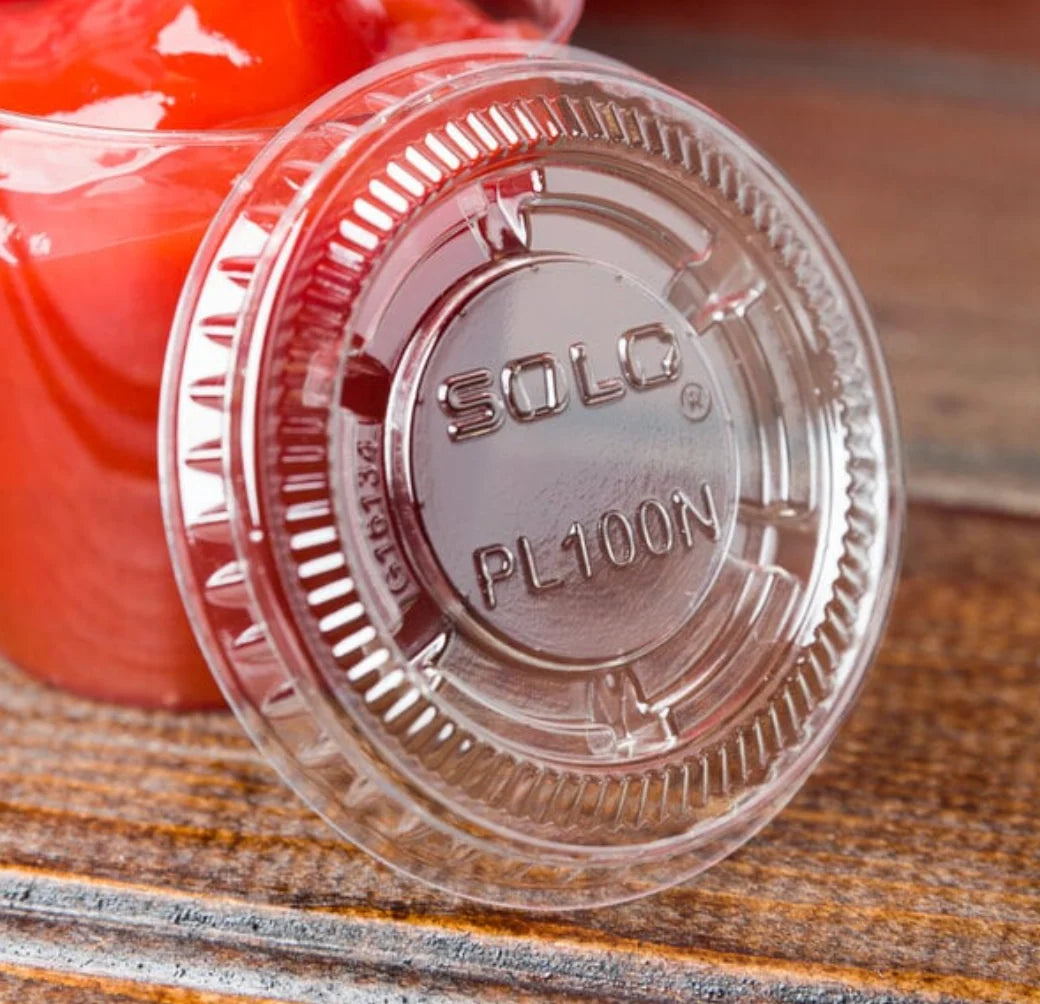 Dart PL100N/PL200N 1oz, 2oz clear plastic lids 2500 pcs - Grocer wholesale