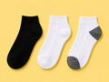 Cushioned low cut ankle socks in black, white and white with gray heel and toe, wholesale bulk socks