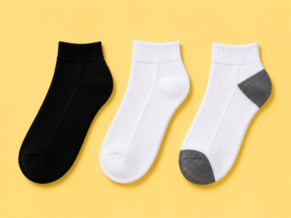 Cushioned low cut ankle socks in black, white and white with gray heel and toe, wholesale bulk socks